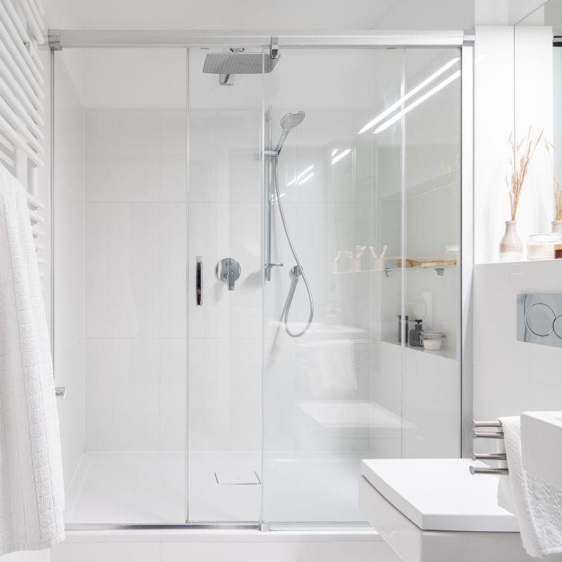 Walk-in shower with rainfall showerhead